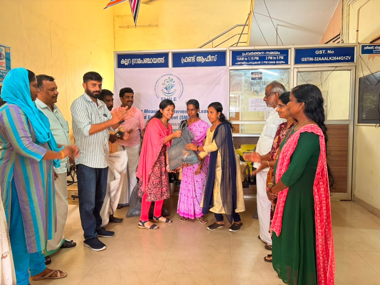 A healthcare worker attending to an elderly woman